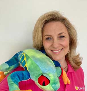 Caterpillar Music Class Leader with large tree frog puppet on her shoulder